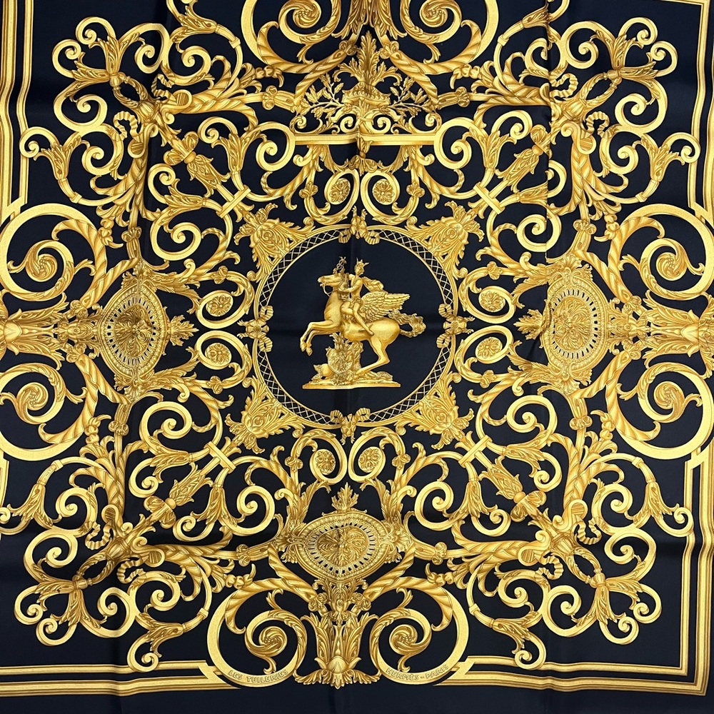 Like new! Hermes Black and Gold Scarf with tag and box. 35x34